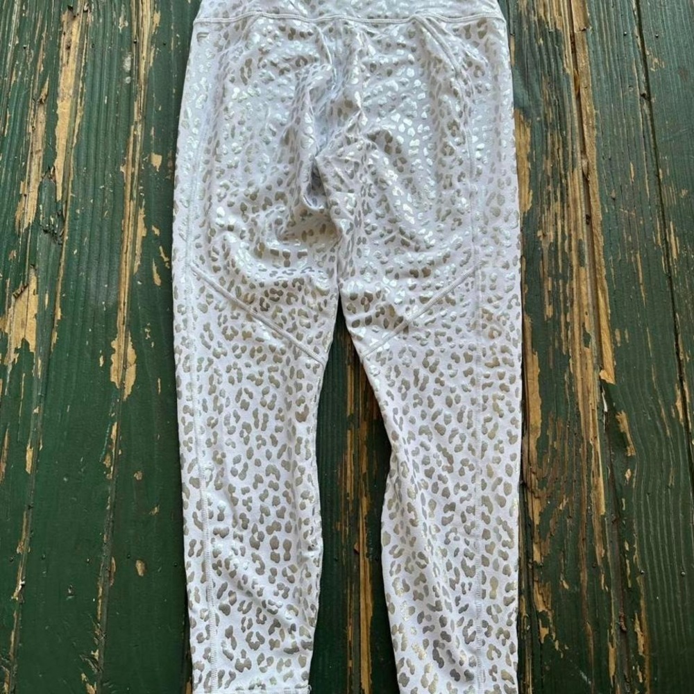 Fabletics power hold White & gold leopard print leggings